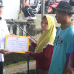 Wabup Misnadi Serahkan Bantuan Bagi Korban Kebakaran di Desa Gedung Wani Kecamatan Runjung Agung Kabupaten Oku Selatan